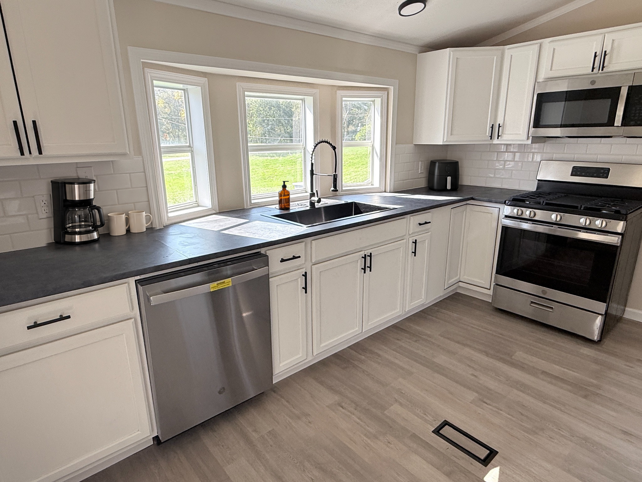 Kitchen at 120 Blythe Road, virtually staged.